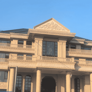 牡丹江黄金麻别墅外墙干挂石材效果示例