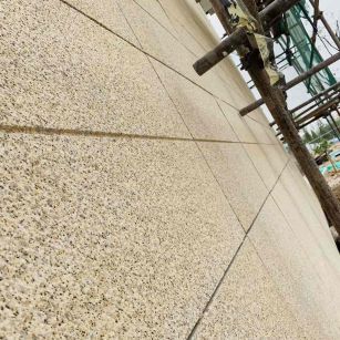 牡丹江 黄金麻花岗岩荔枝面外墙干挂石材效果示例