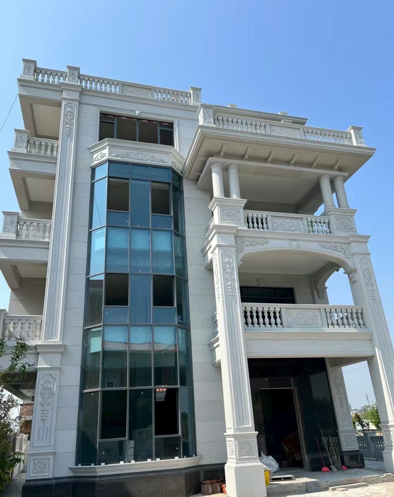 牡丹江 白麻花岗岩别墅外墙干挂效果展示