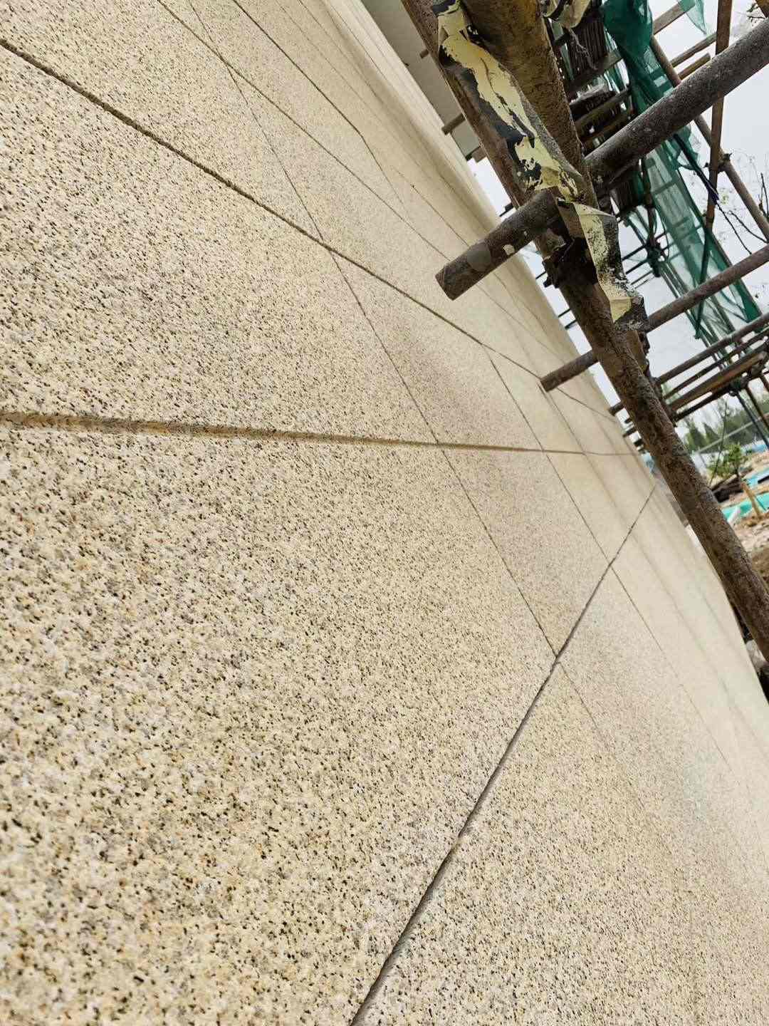 牡丹江 黄金麻花岗岩荔枝面外墙干挂石材效果示例